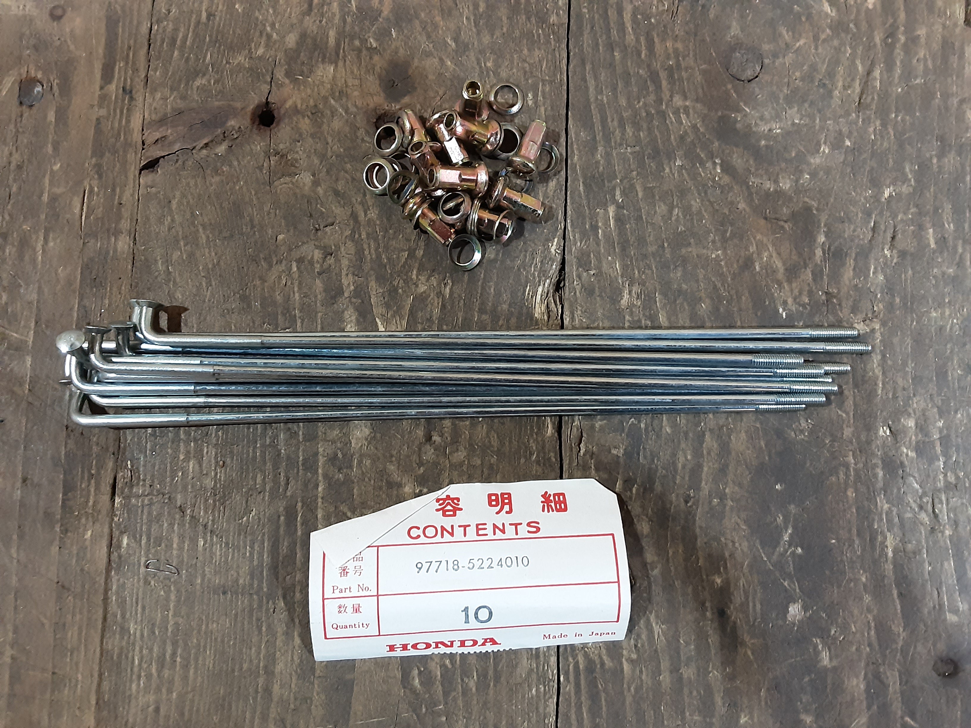 Honda CB200 ,Spoke B with Nipples, Genuine NOS Honda Part Number 97718-5224010.