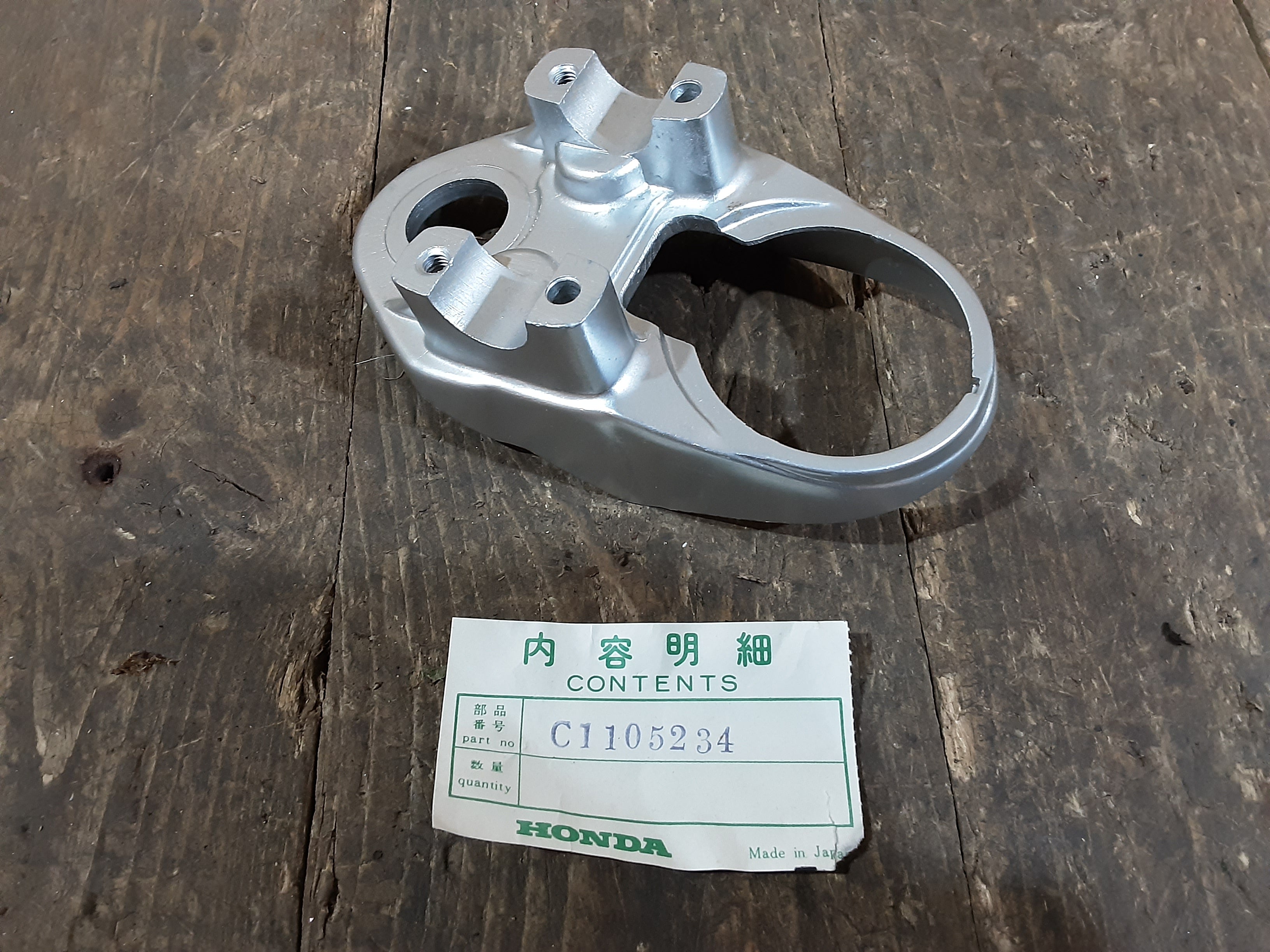 Honda C110 C115 ,Handlebar Speedo Clamp, Genuine NOS Part Number 53132-011-000