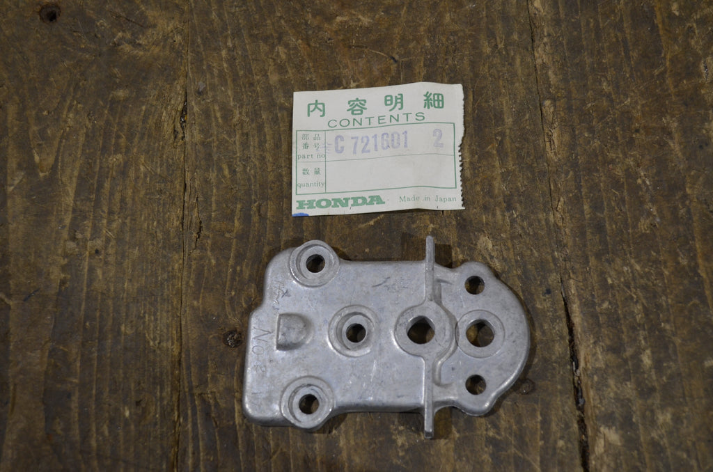 Honda C72 ,Oil Pump Cover, Genuine NOS Honda Part Number C7216012