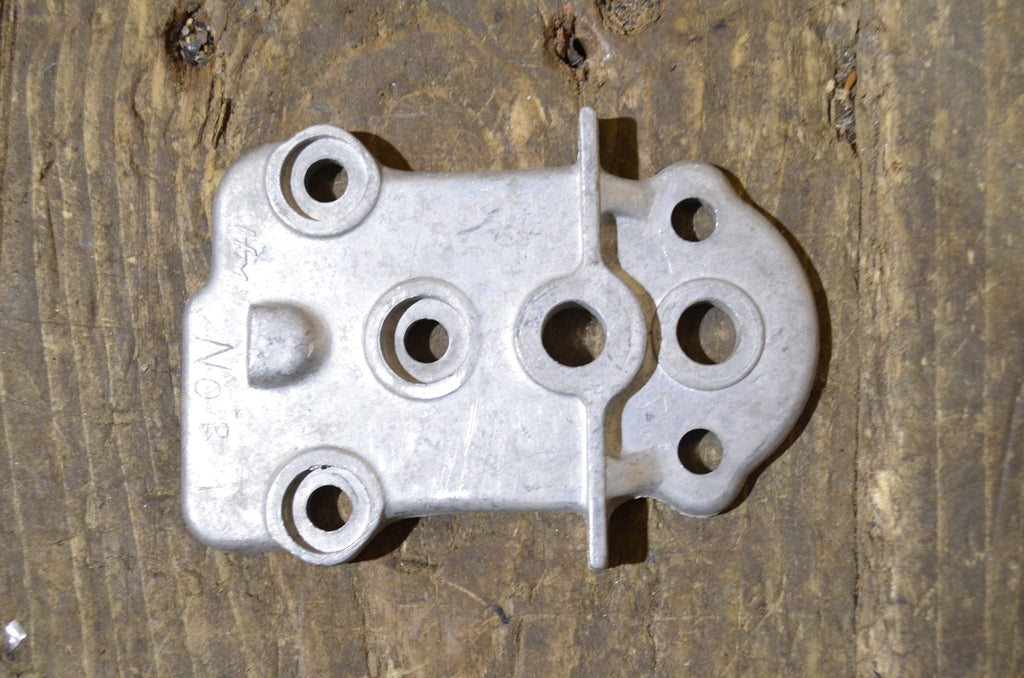 Honda C72 ,Oil Pump Cover, Genuine NOS Honda Part Number C7216012