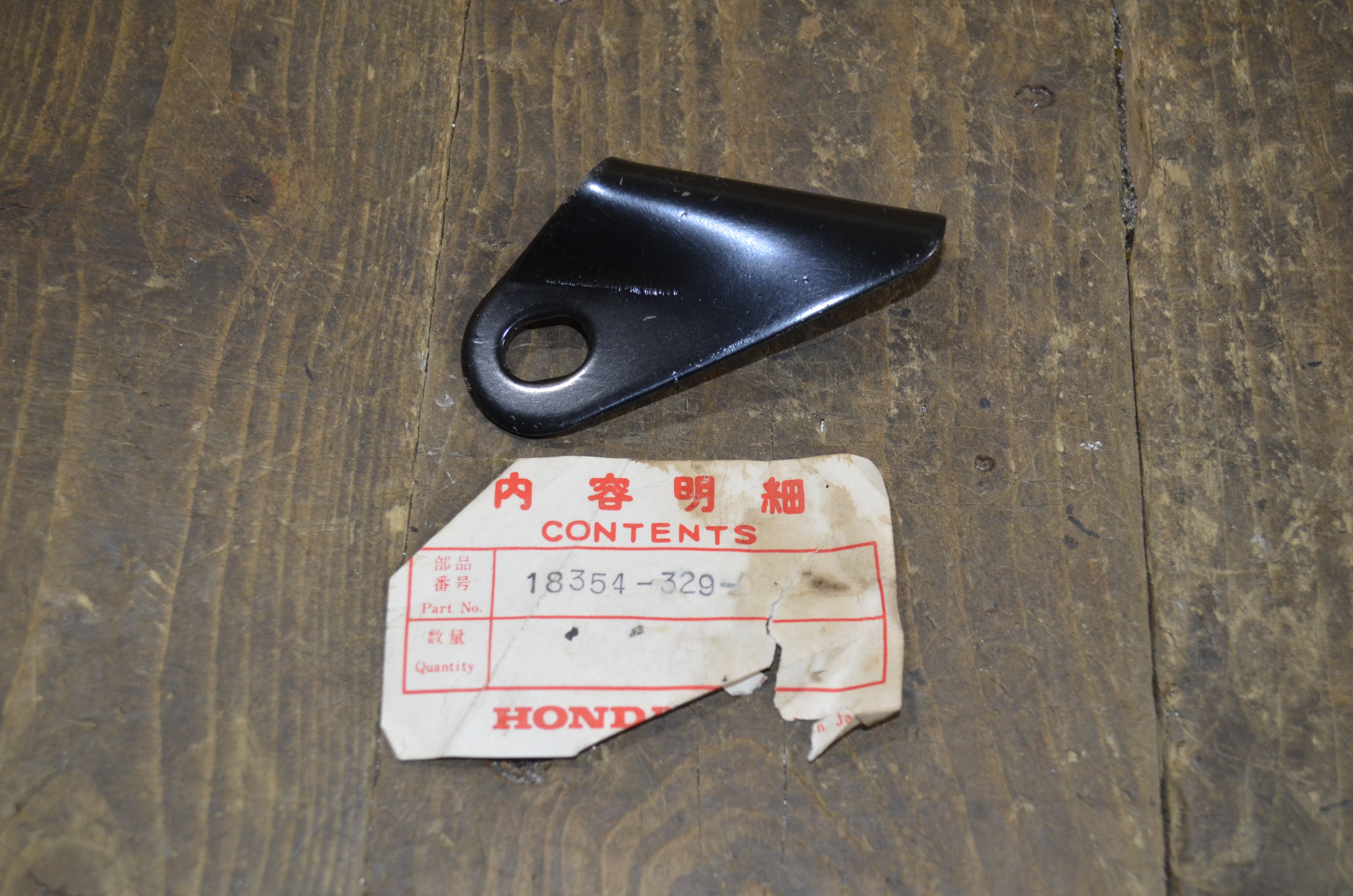 Honda SL250 XL250 ,Exhaust Bracket, Genuine NOS Honda Part Number 18354-329-000