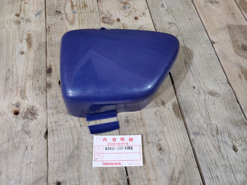 Honda CD90 ,Battery Cover, NOS Honda Part Number 83600-030-000E Blue Shop Soiled