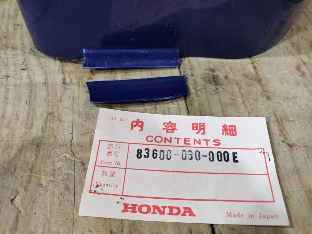 Honda CD90 ,Battery Cover, NOS Honda Part Number 83600-030-000E Blue Shop Soiled