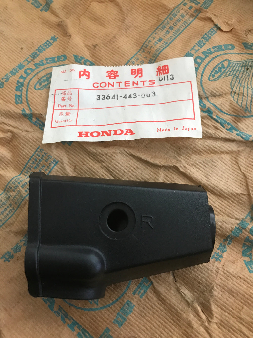 Honda CB250N ,Right Rear Indicator Cover, Genuine NOS Part Number 33641-443-003