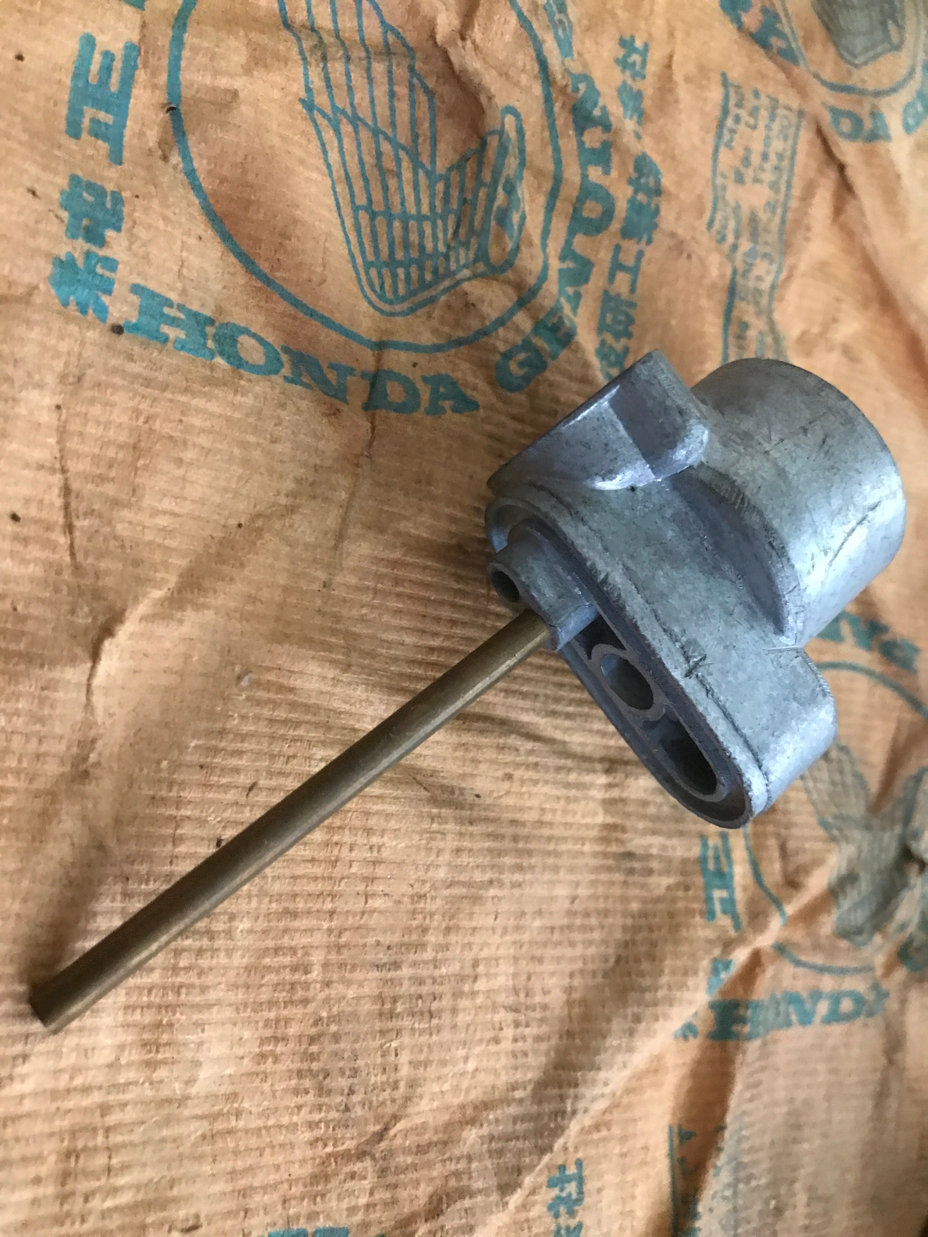 Honda C110 C115 C200 CA110 CA200 CB50M CD90 ,Fuel Tap Body, Genuine NOS Honda Part Number 16951-011-020
