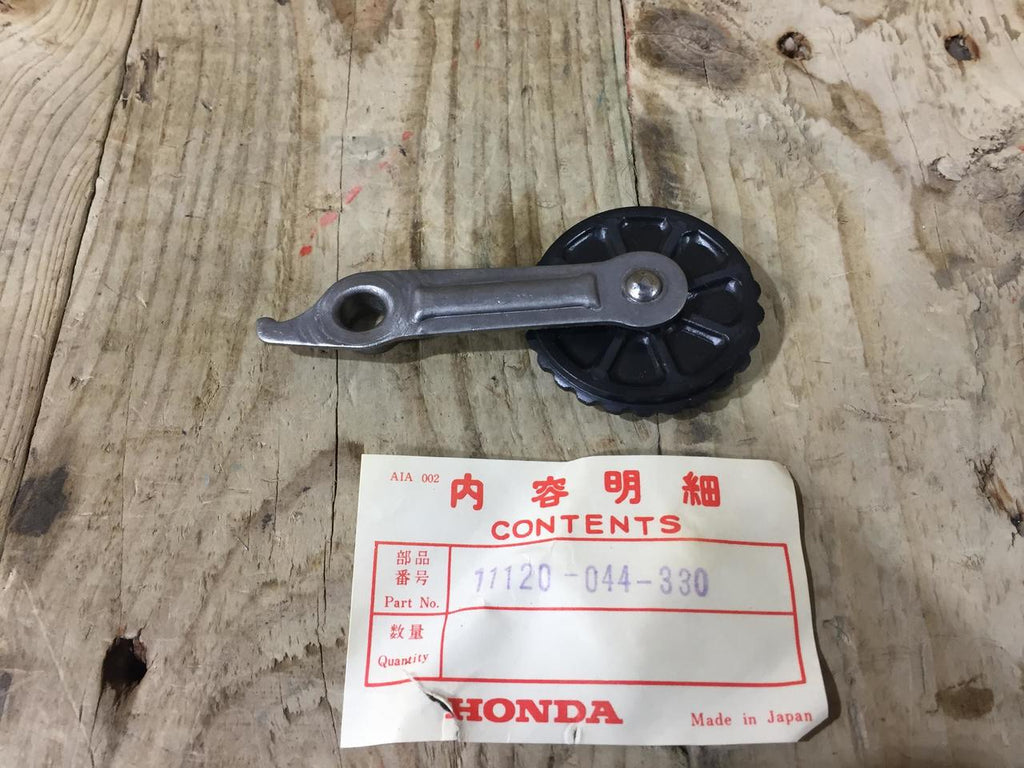 Honda P50 ,Cam Chain Tensioner, NOS Genuine Honda Part Number 11120-044-330