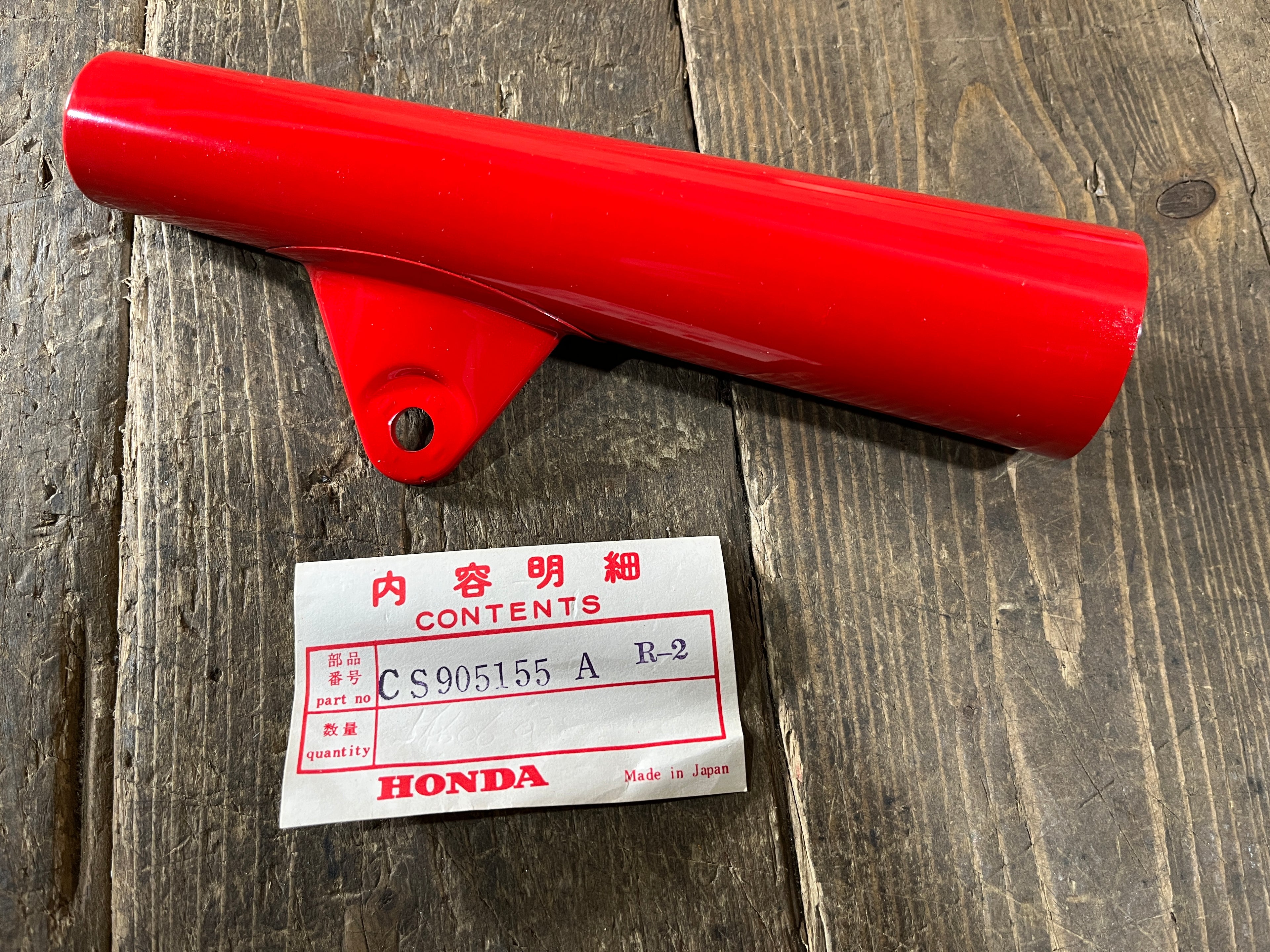 Honda CL90 S90 ,Left Side Fork Cover Headlight Bracket, NOS Part Number CS905155-A
