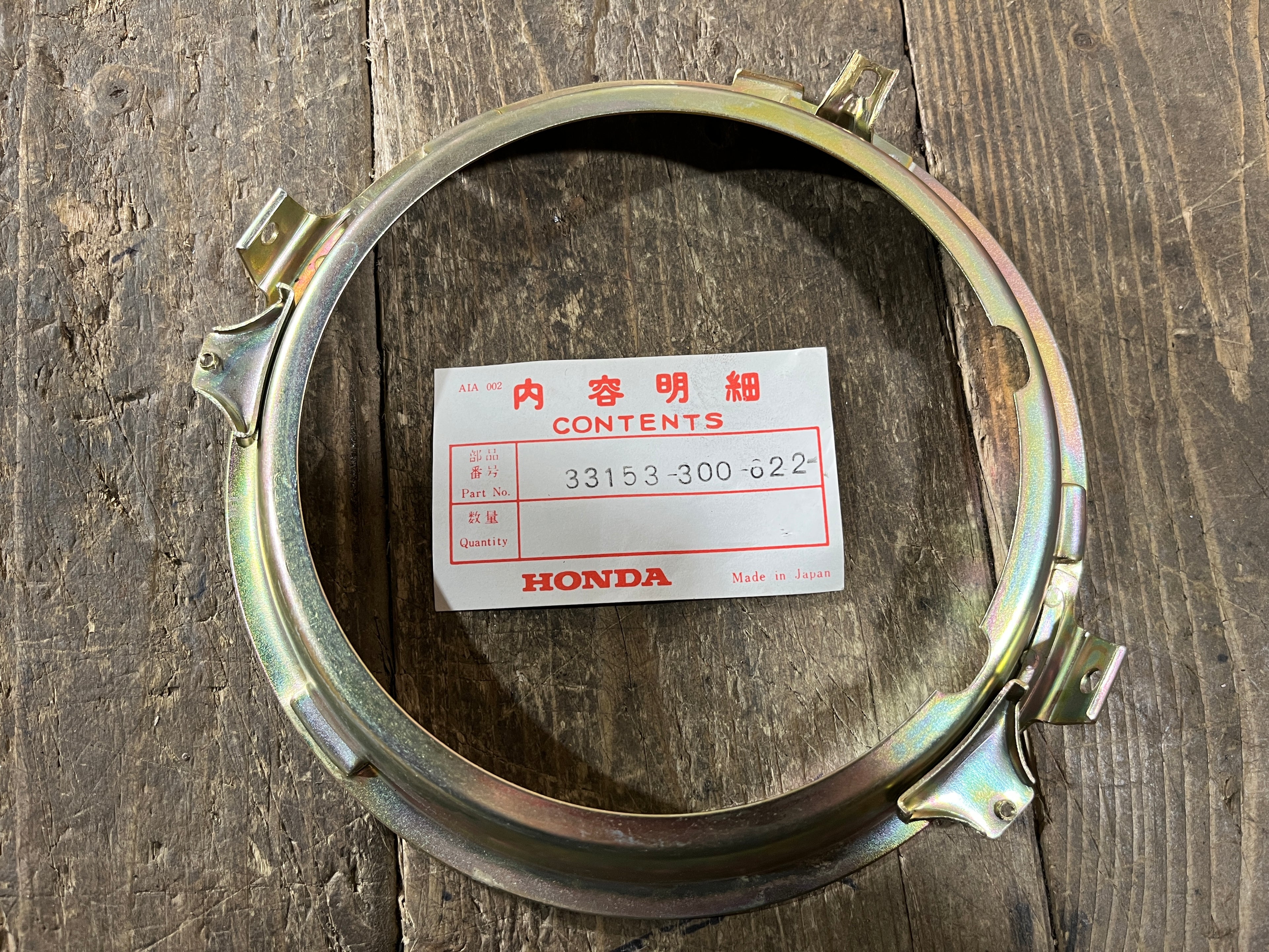 Honda CB450 CB500 ,Headlight Mounting Ring, NOS Honda Part Number 33153-300-622