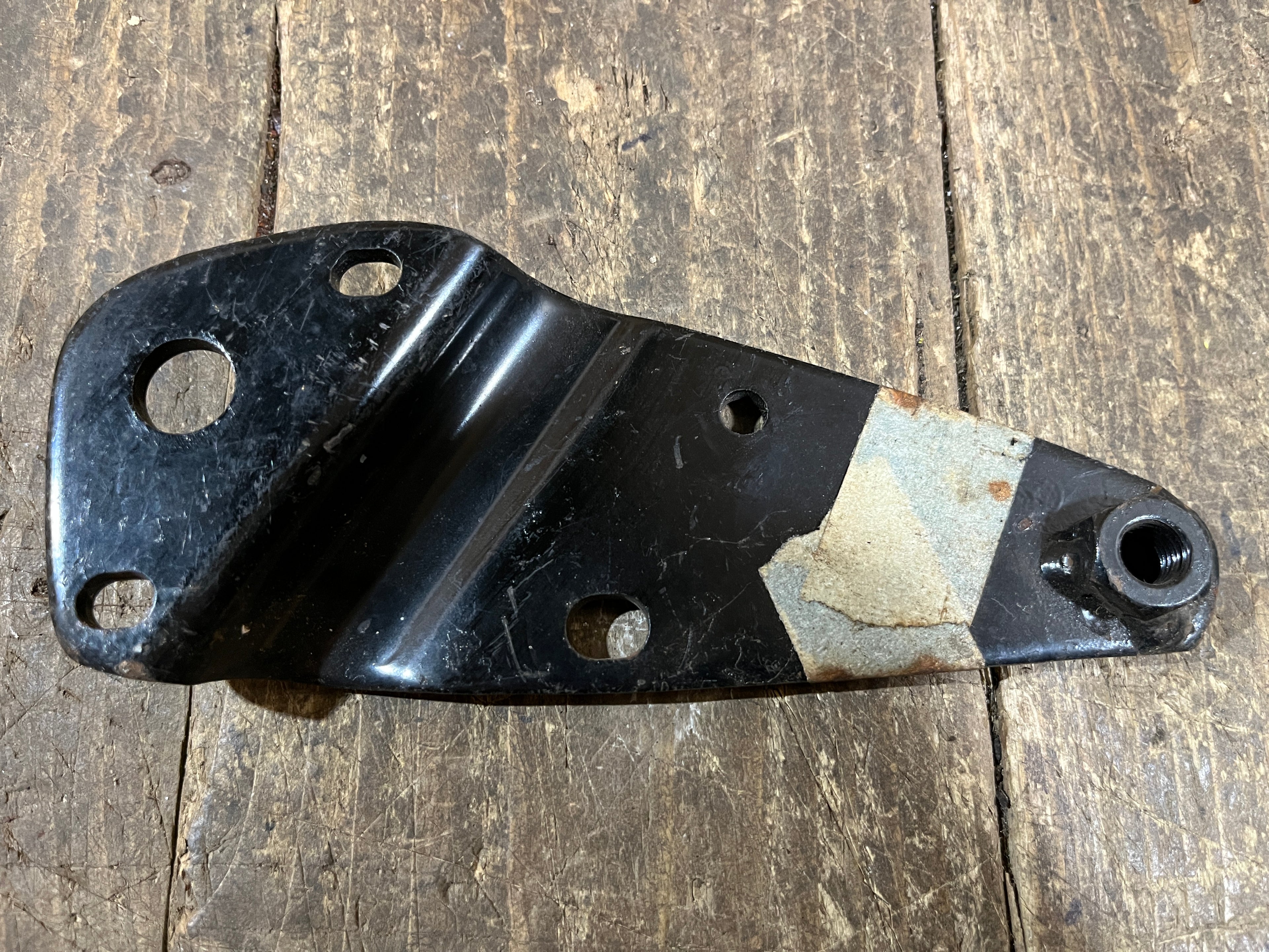 Honda CD175,Right Pillion Bracket, Genuine NOS Shop Soiled Part Number 50711-303-030Z