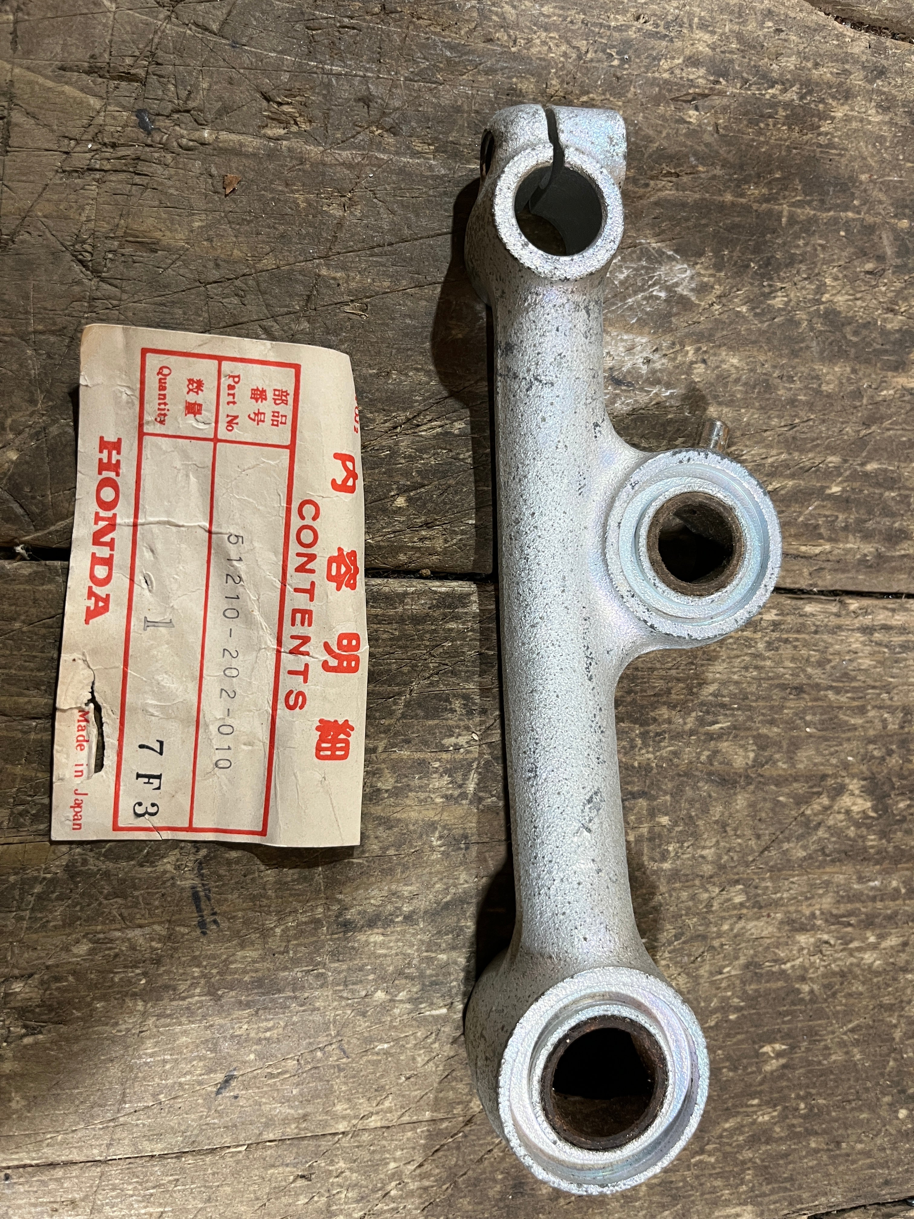 Honda C92 C95,Right Side Suspension Arm, Genuine NOS Part Number 51210-202-010