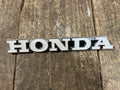 Honda CL450 ,Left Side Fuel tank Emblem, Genuine NOS Part Number 87122-294-670