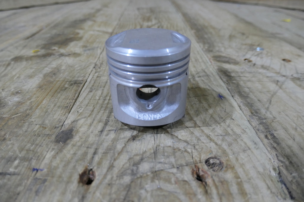 Honda CB100 ,Piston 0.25 Oversize, NOS Genuine Honda Part Number 13102-107-760