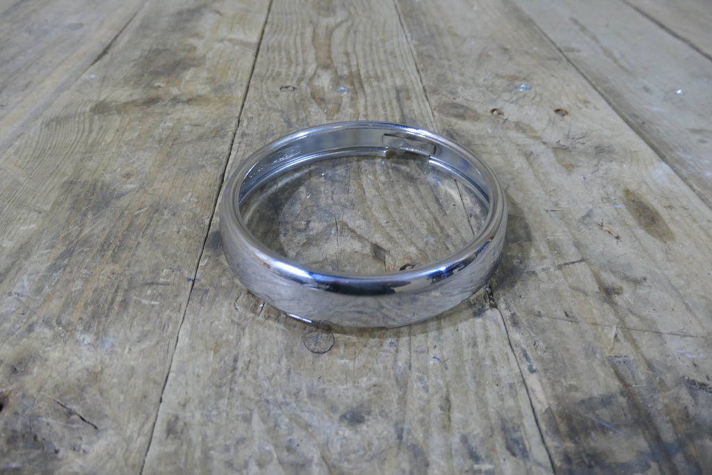 Honda SS50E ,Headlight Rim, Genuine NOS Honda Part Number 33101-028-823