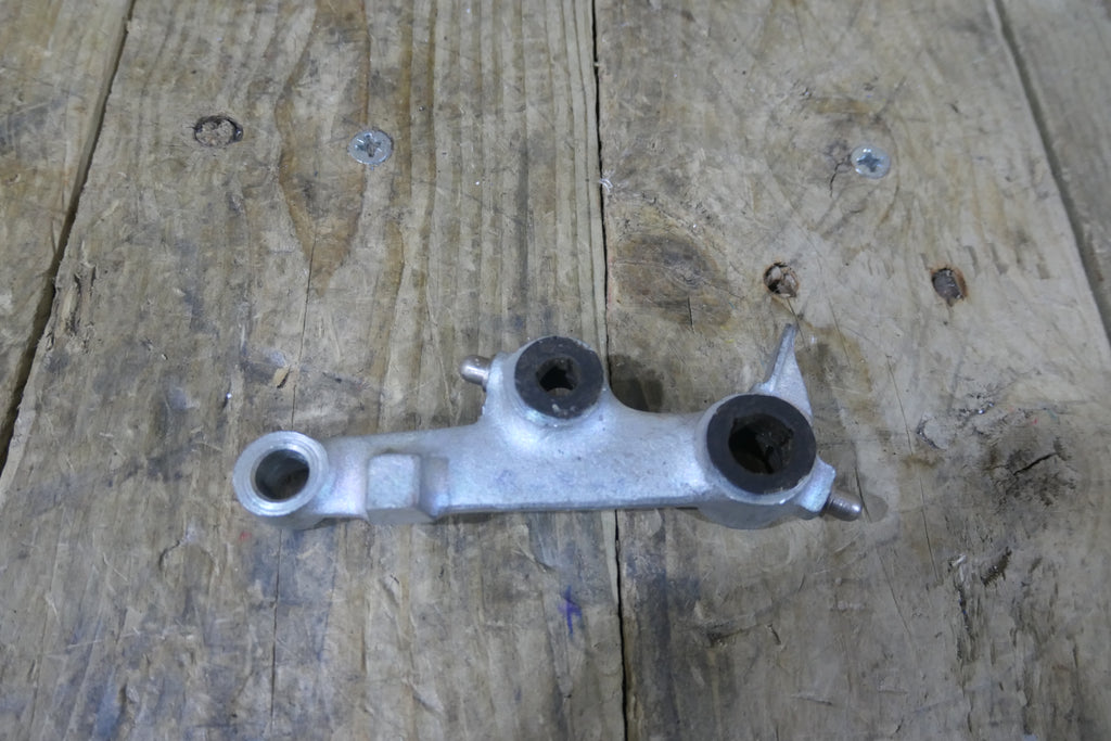Honda P50 P25 ,Right Suspension Arm, Genuine NOS Honda Part Number 51210-044-040