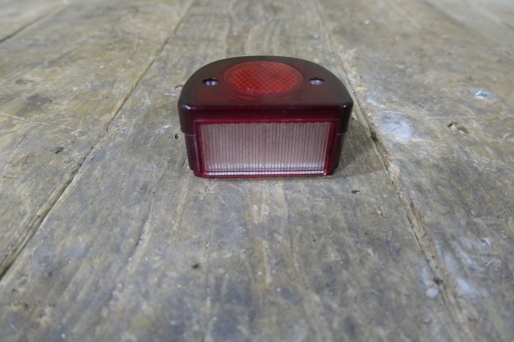Honda C110 C115 ,Tail Light Cover, Genuine NOS Honda Part Number 33701-011-000