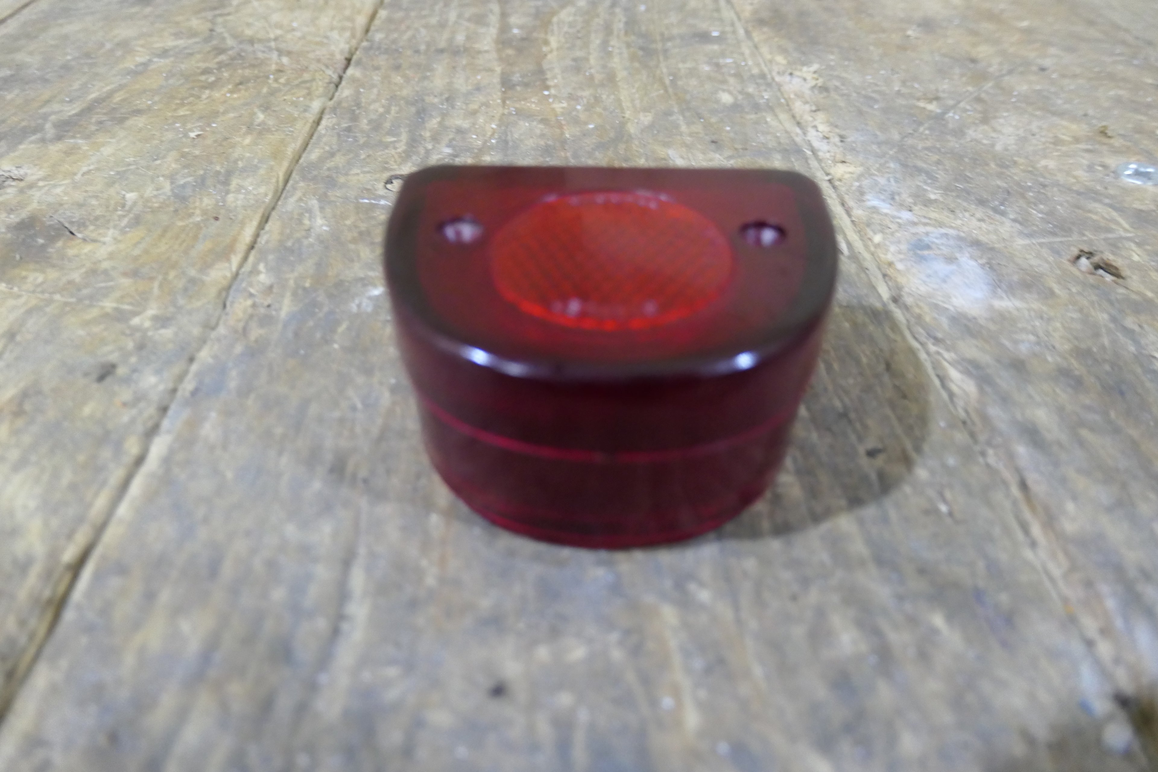 Honda C110 C115 ,Tail Light Cover, Genuine NOS Honda Part Number 33701-011-000