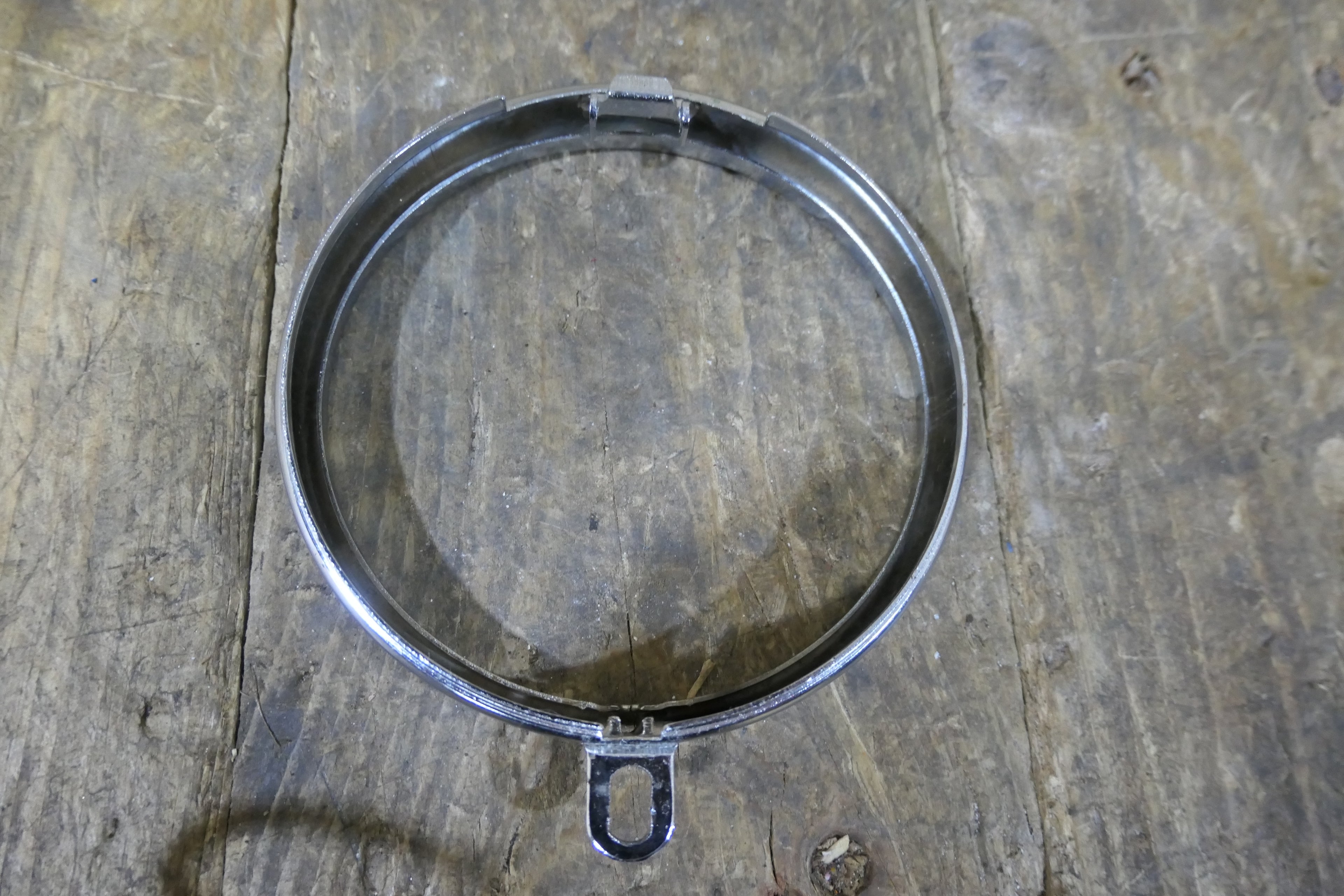 Honda C100 C102 C110, Headlight Lens Rim, Small Hinge NOS Genuine 33101-001-000