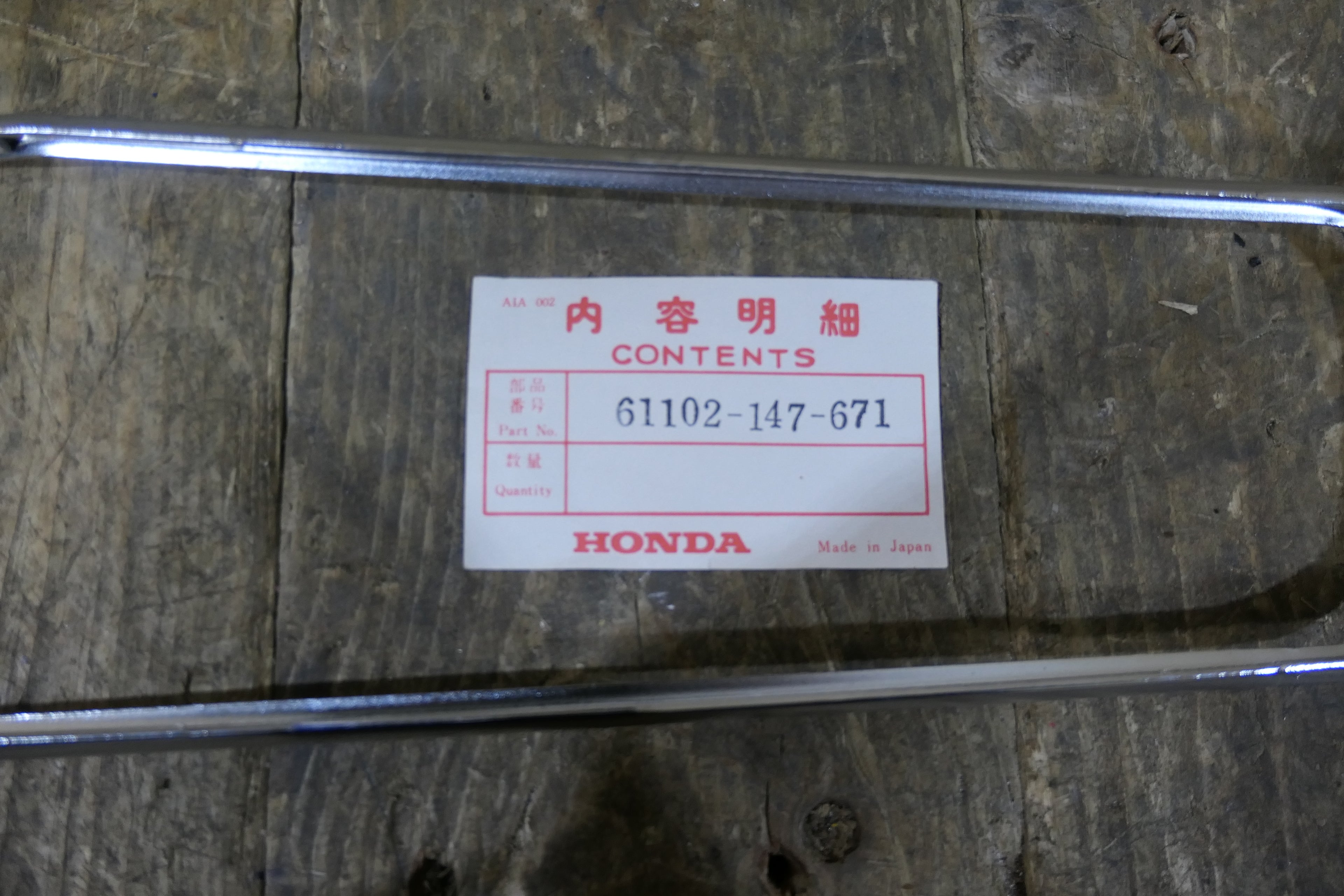Honda NC50 NA50 ,Front Fender Stay, Genuine NOS Honda Part Number 61102-147-671