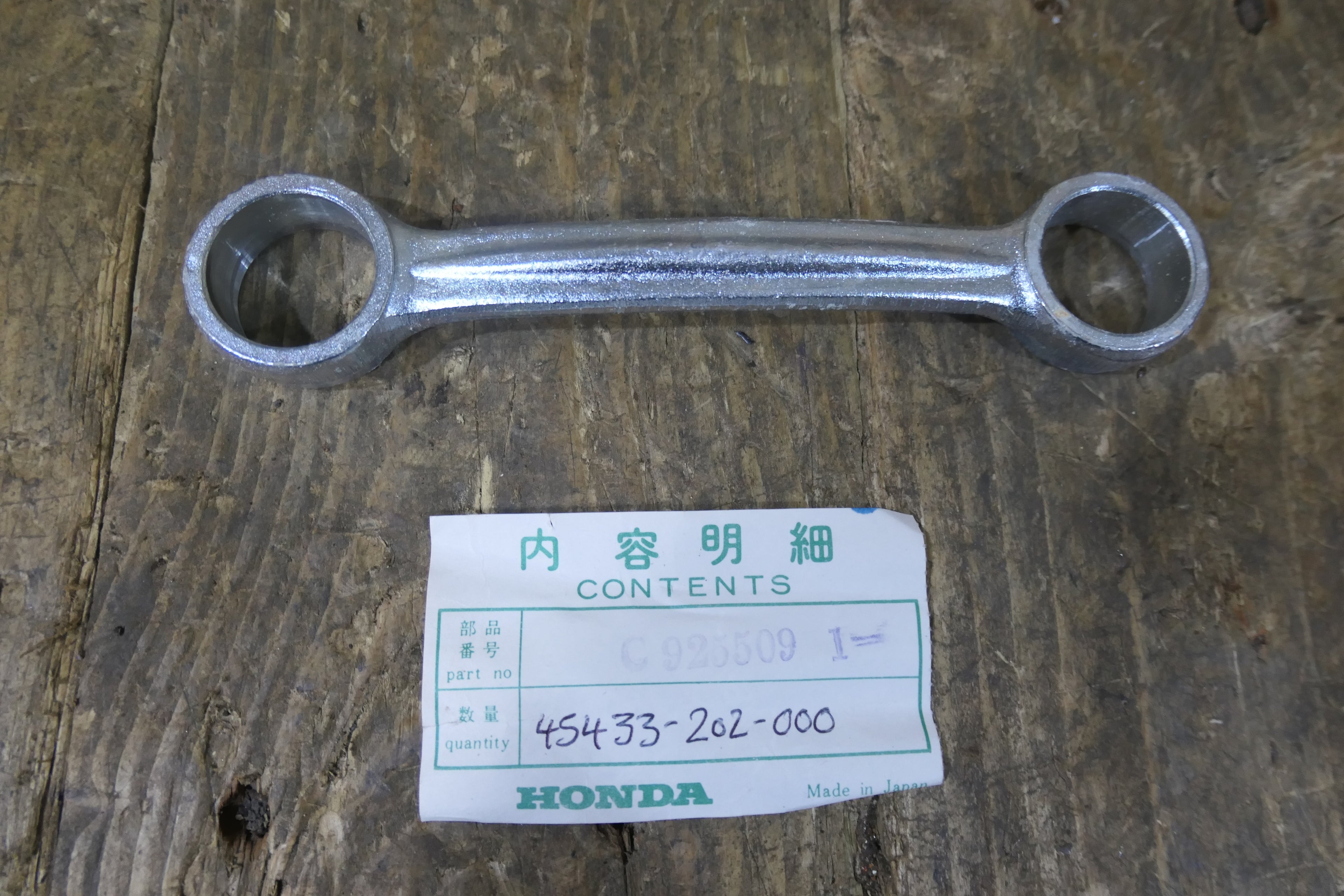 Honda C92 C95 ,Front Brake Torque Link Arm, Genuine NOS Part Number 45433-202-000