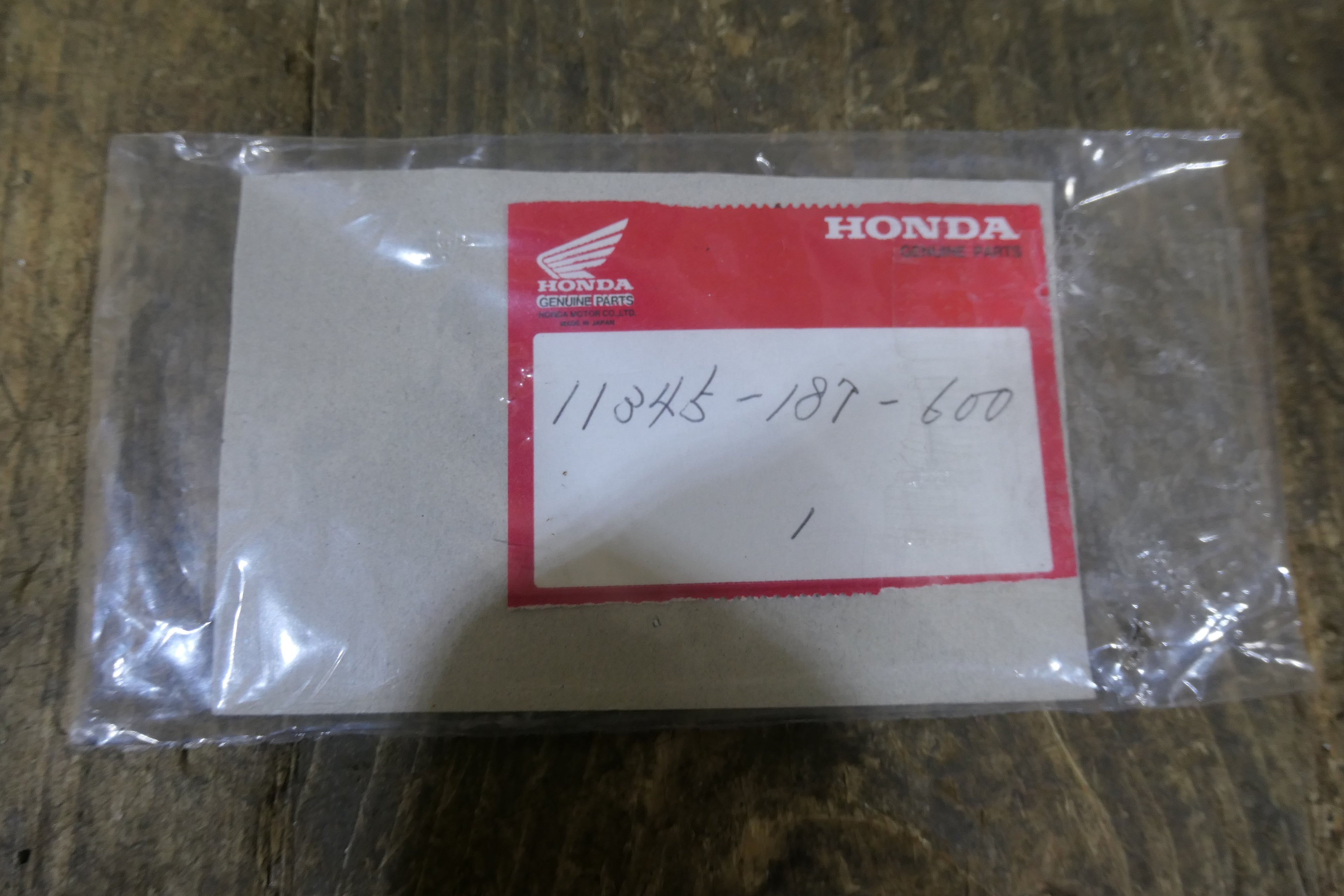 Honda NX50M Express ,Left Side Cover Emblem, Genuine NOS 11345-187-600