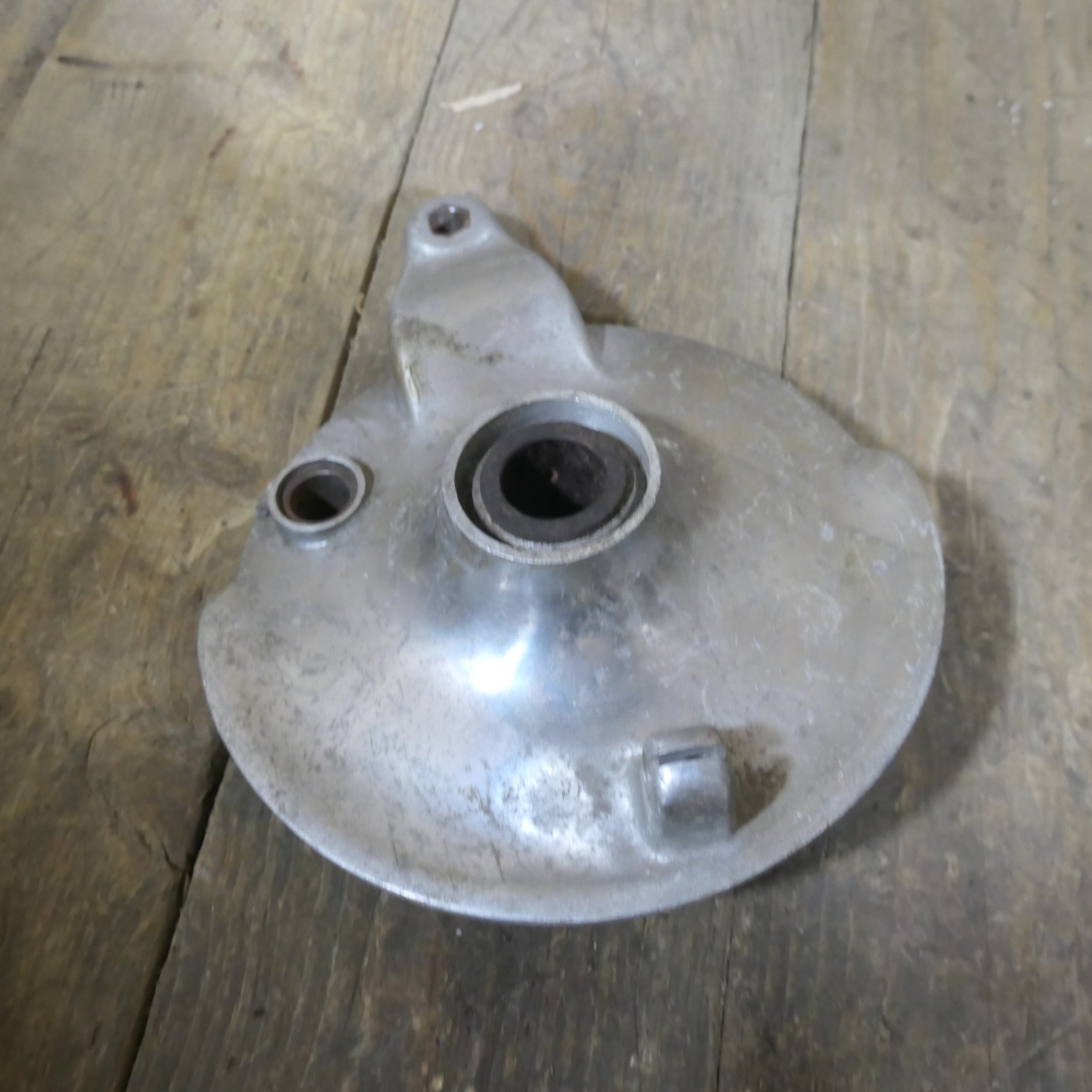 Honda C92 C95 ,Front Brake Plate, NOS Shop Soiled Honda Part Number 45100-202-020