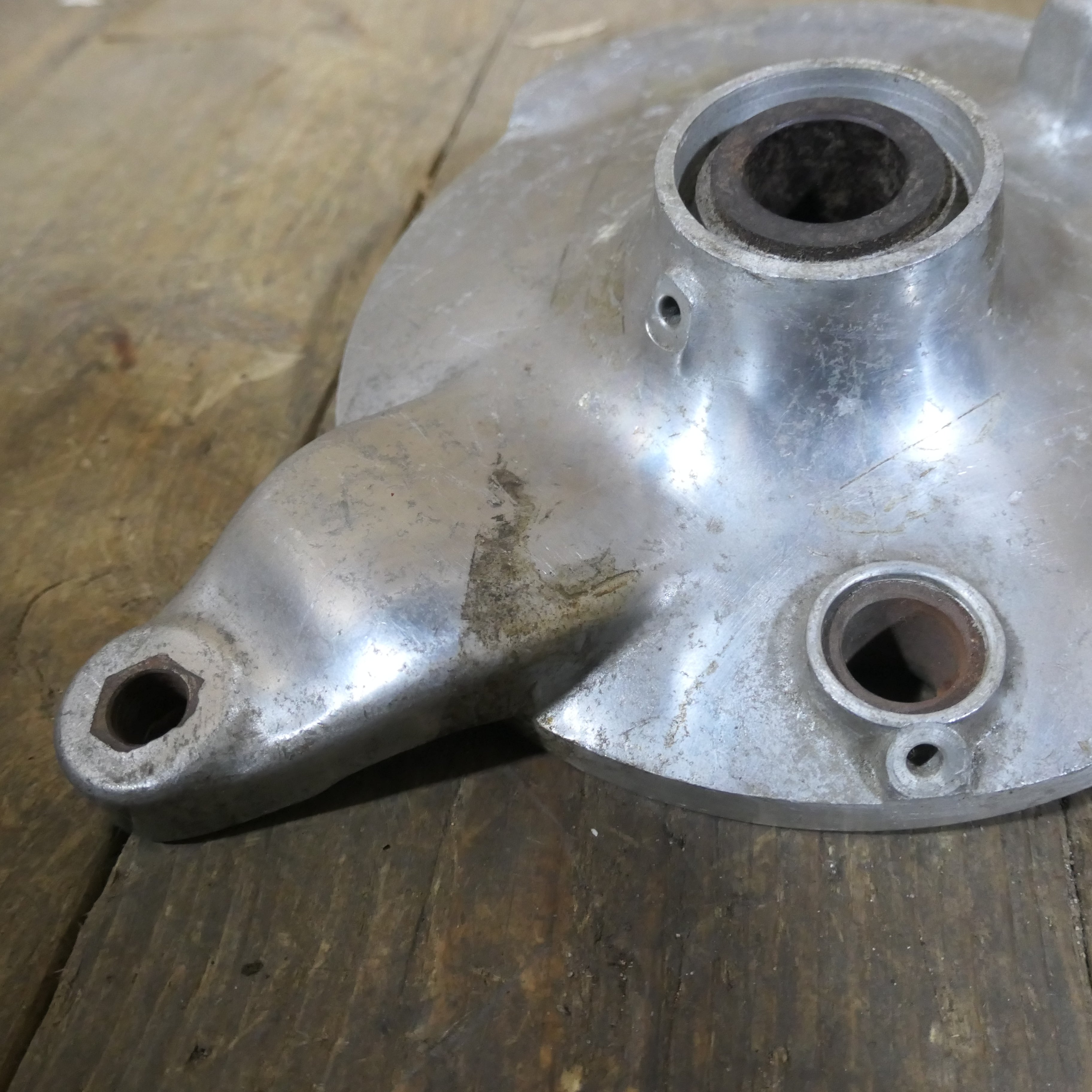 Honda C92 C95 ,Front Brake Plate, NOS Shop Soiled Honda Part Number 45100-202-020