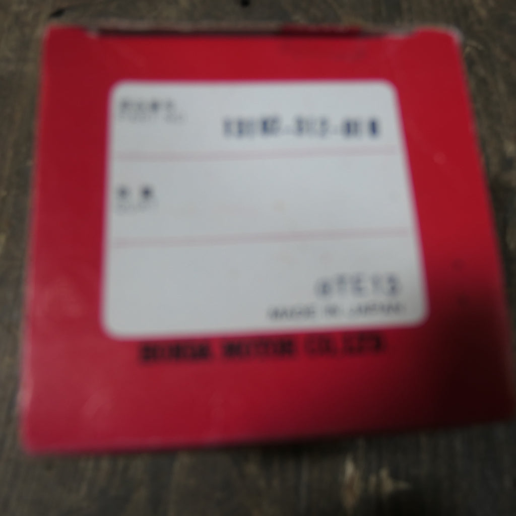 Honda CB350 ,Piston 0.25 Oversize, Genuine NOS Honda Part Number 13102-312-010.