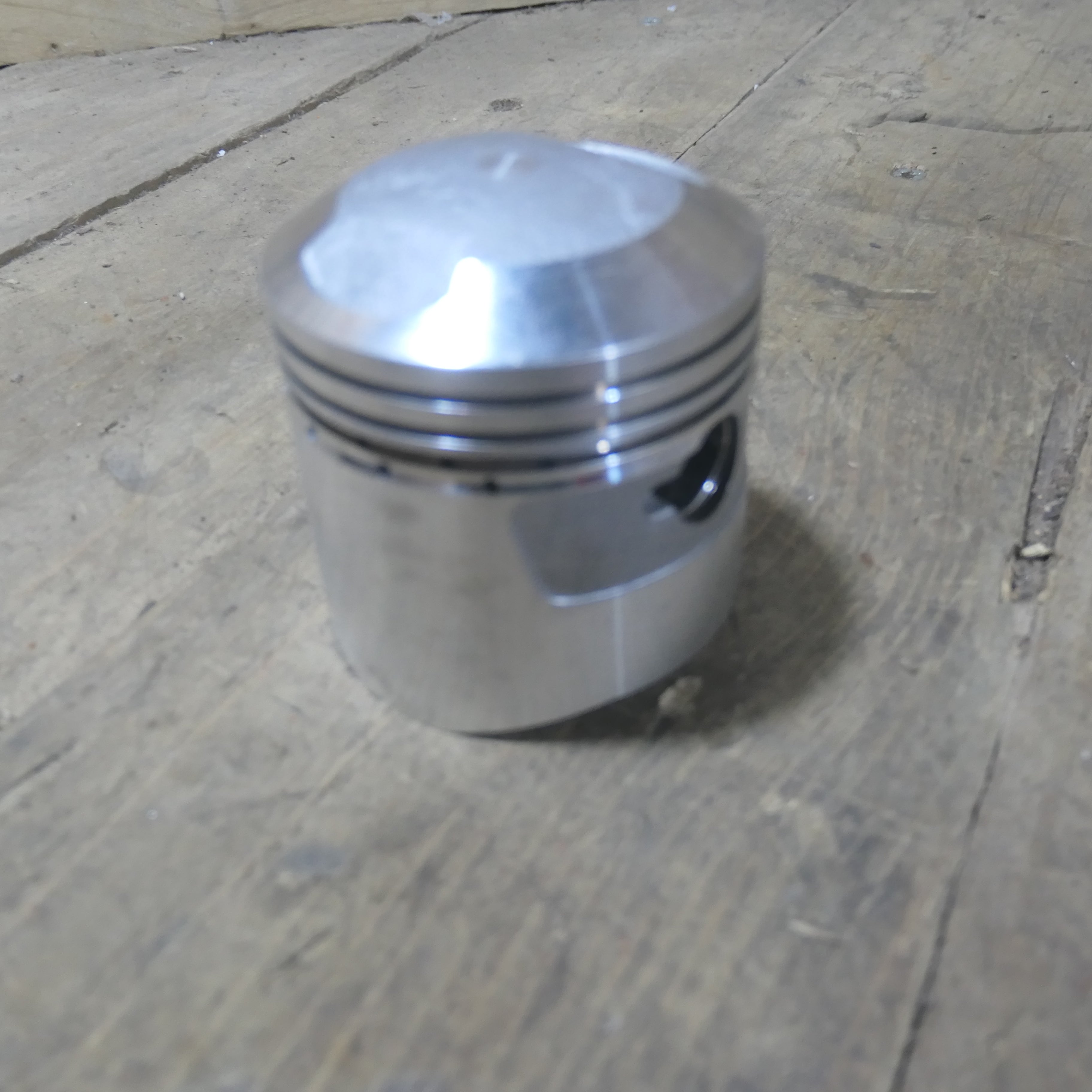 Honda CB350 ,Piston 0.25 Oversize, Genuine NOS Honda Part Number 13102-312-010.