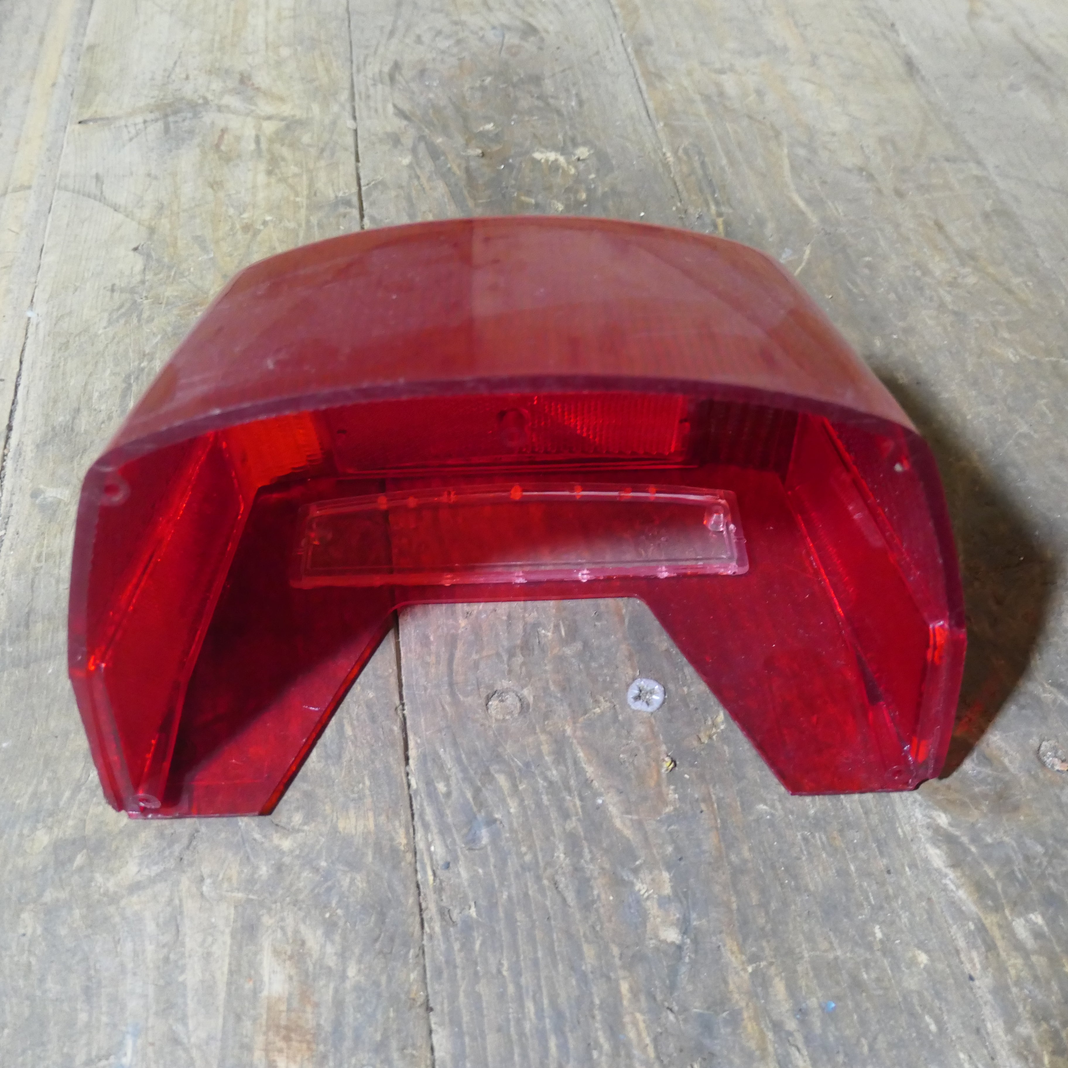 Honda CX500 CB650 CB750 ,Rear Tail Light Lens, NOS Honda Part Number 33702-415-601.
