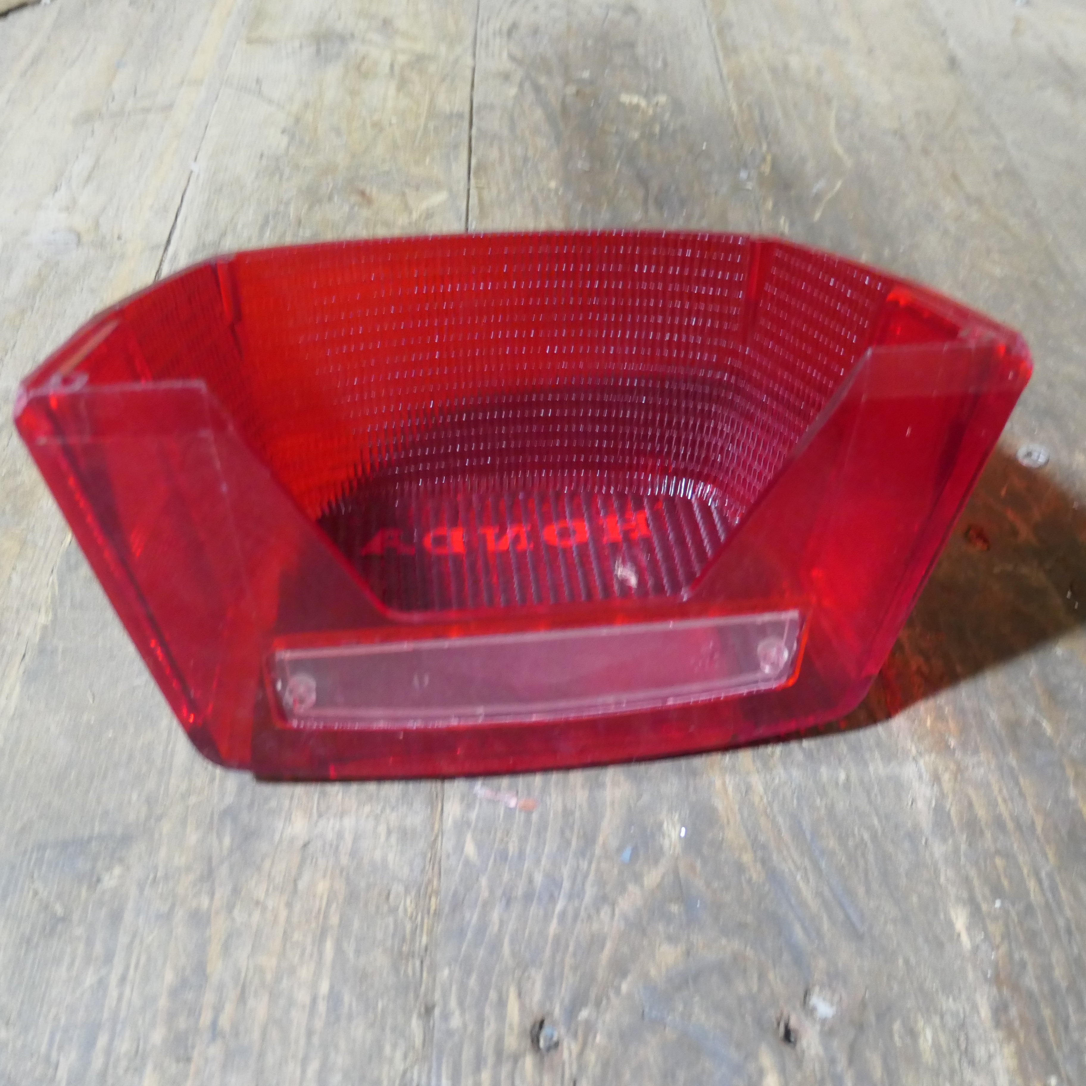 Honda CX500 CB650 CB750 ,Rear Tail Light Lens, NOS Honda Part Number 33702-415-601.