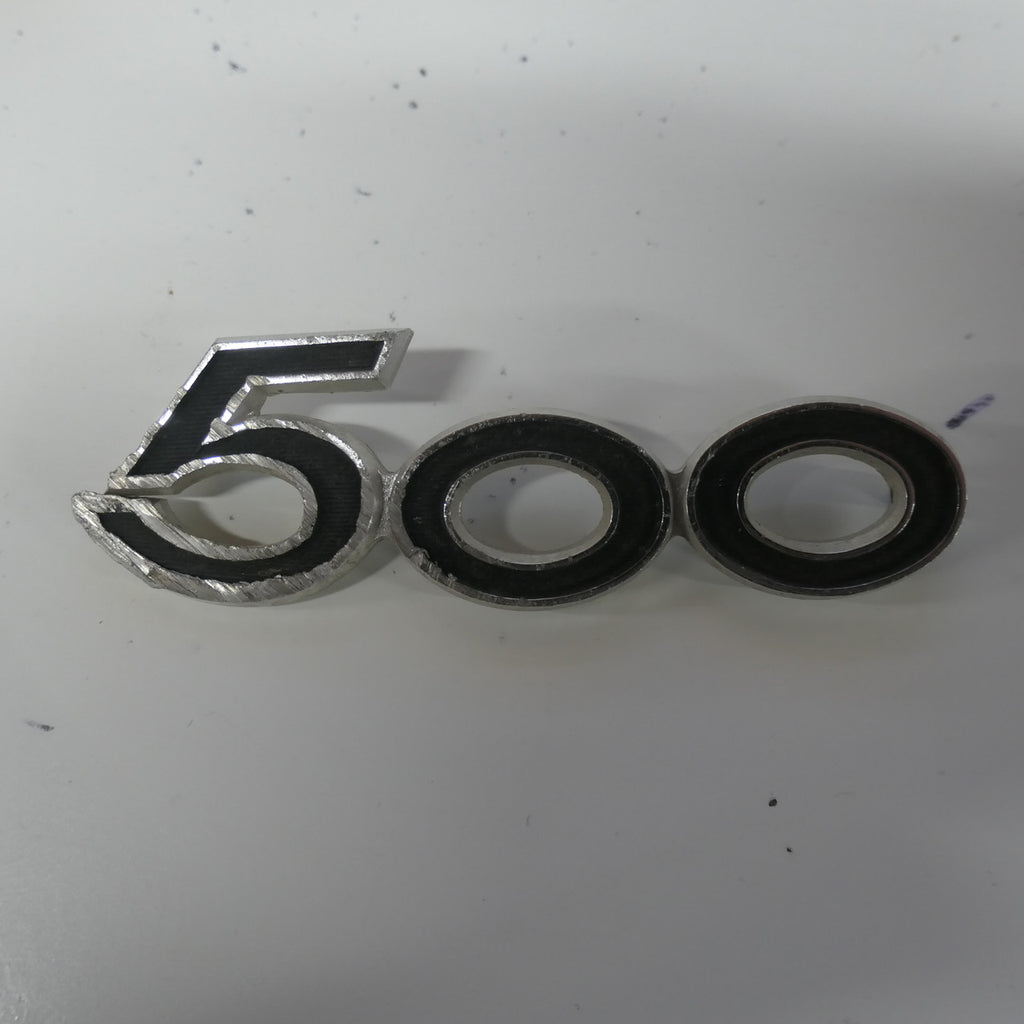 1969 SUZUKI T500 TITAN USED ,SIDE PANEL EMBLEM BADGE, 500CC TWO STROKE TWIN