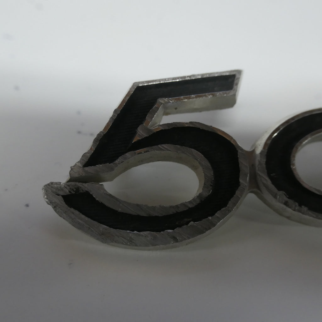 1969 SUZUKI T500 TITAN USED ,SIDE PANEL EMBLEM BADGE, 500CC TWO STROKE TWIN